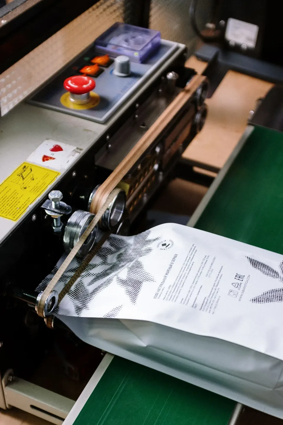 Packaging Machine — Industrial Manufacturing — Packaging Machine, Conveyor Belt, Emergency Stop Button, Industrial Manufactu…